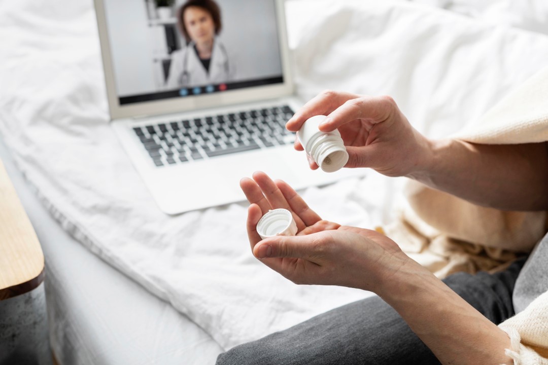 Woman having a video call with a nurse