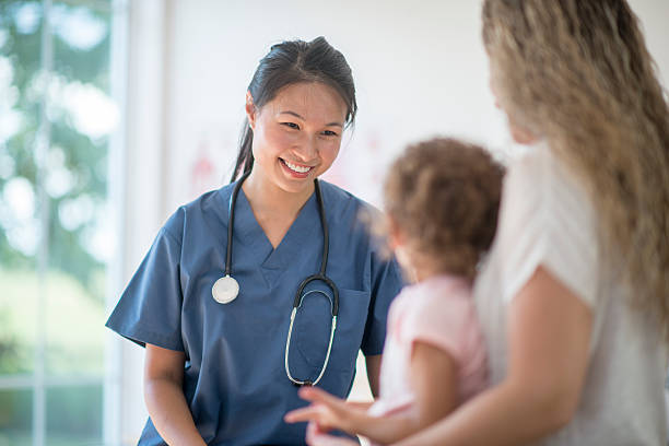 nurse smiling with a patient