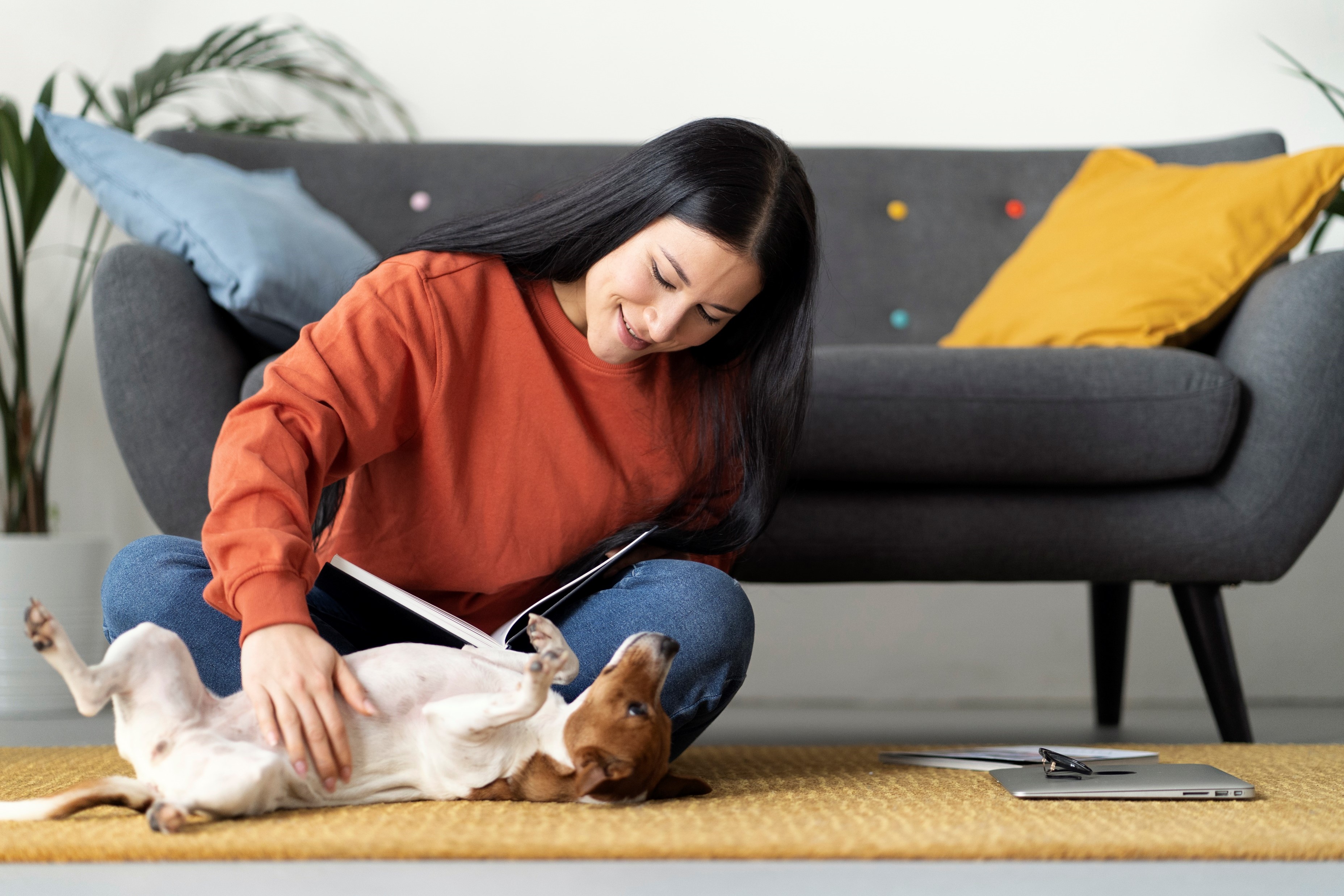 Woman playing with a dog