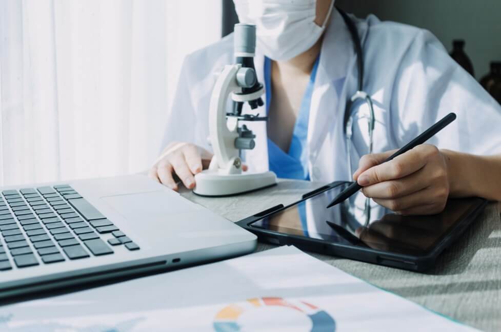 Medicine doctor or pharmacist use tablet or mobile phone