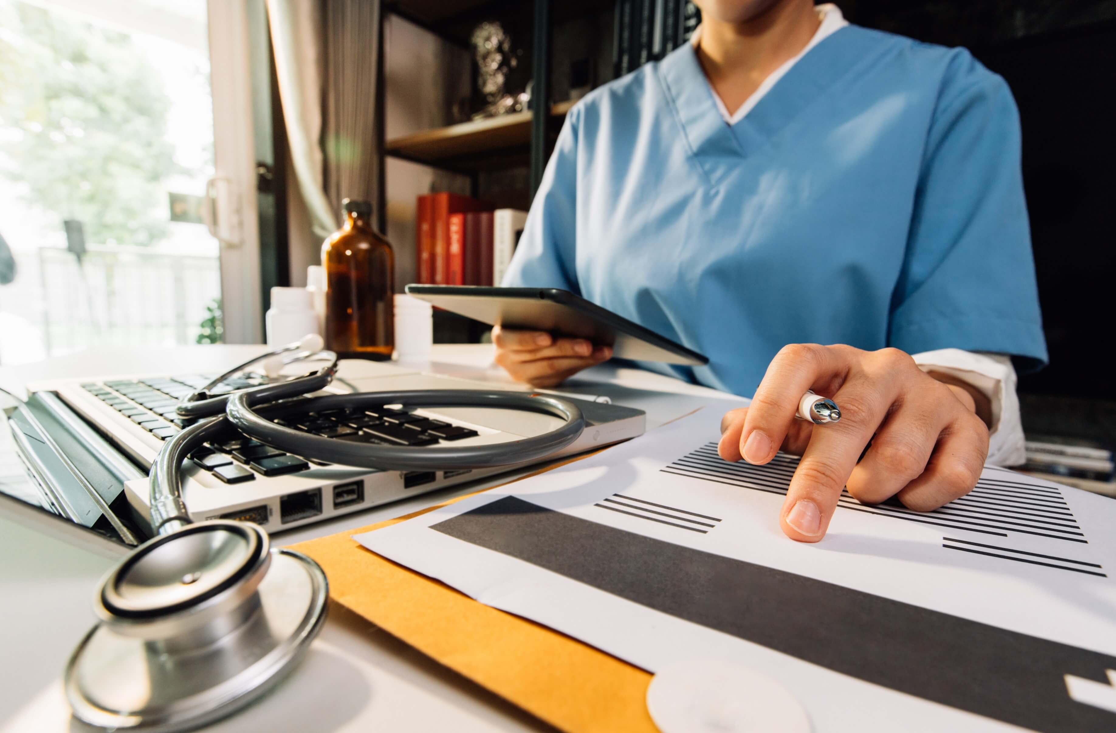 nurse checking records