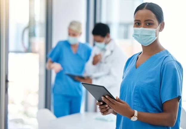 Nurse holding tablet
