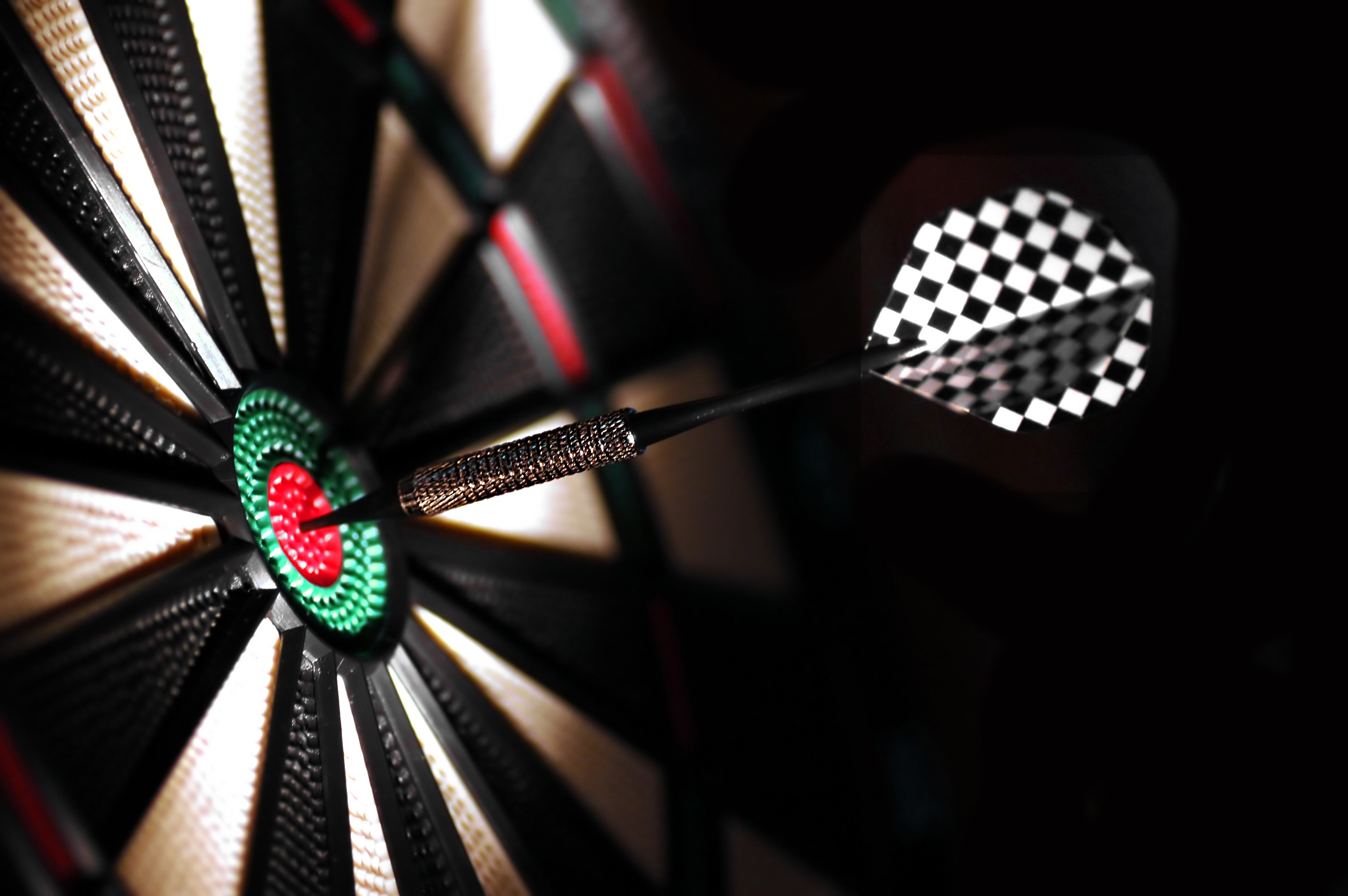 Dart hitting bulls eye